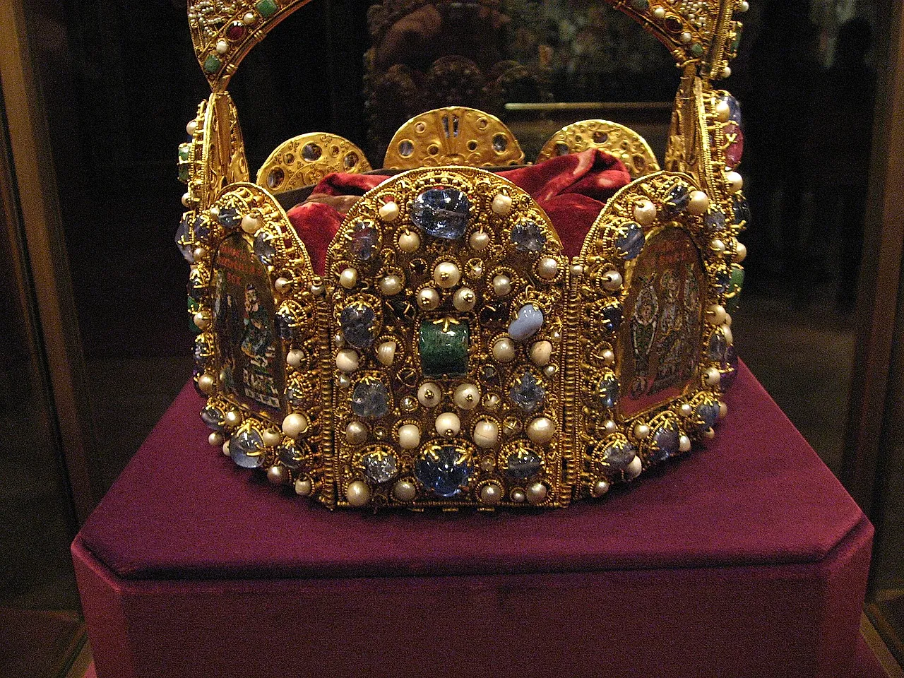 The Imperial Crown of the Holy Roman Empire on red velvet in the Secular Treasury